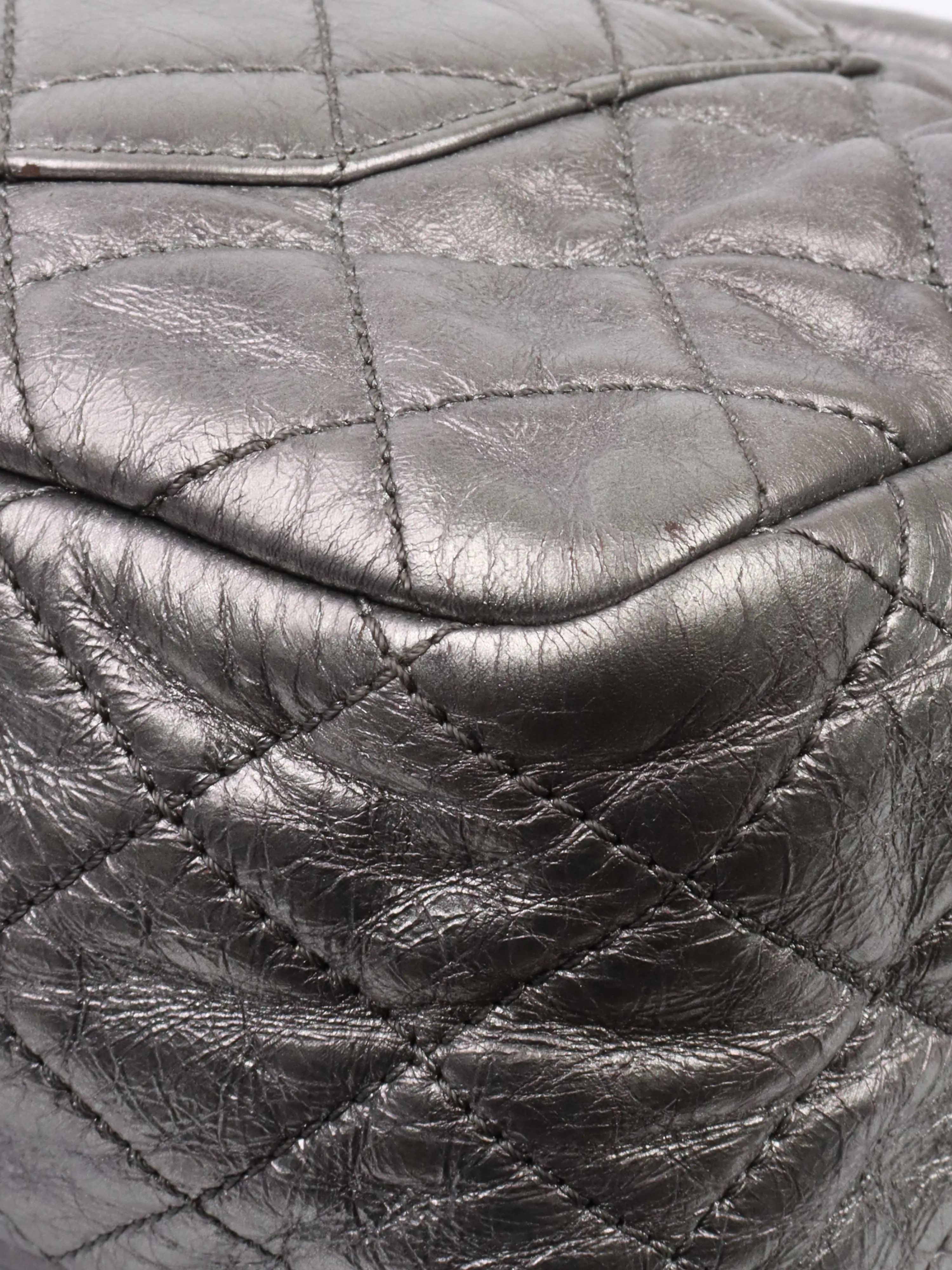 Chanel Metallic Silver 2.55 Reissue Camera Bag.