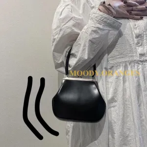 COMME des GARÇONS Aoyama Mini Clutch