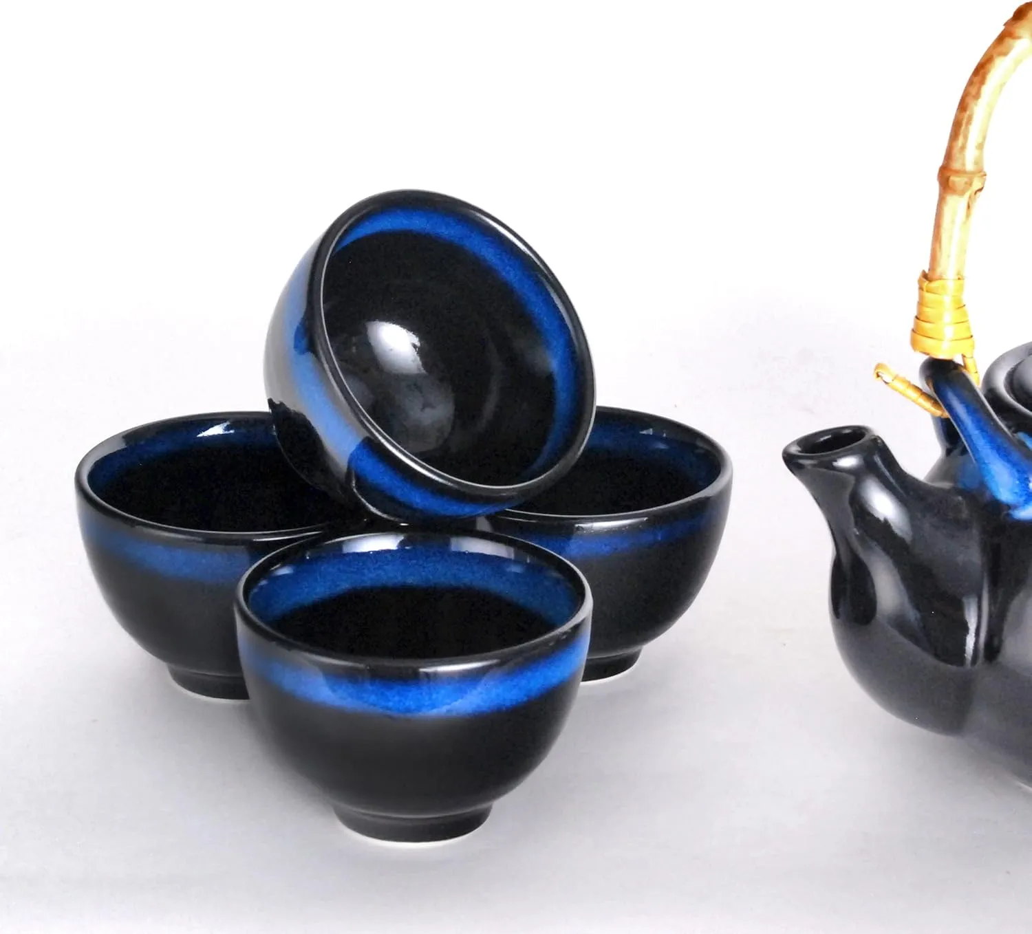 Hinomaru Collection Kagetsu Reactive Glazed Porcelain Japanese Style Tea Set 24 fl oz Teapot with Rattan Handle and Four Tea Cups (Black/Blue)