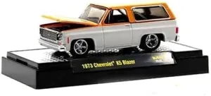 M2 1973 Chevy K5 Blazer Orange Metallic and White Metallic Limited Edition to 6600 Pieces Worldwide 1/64 Diecast Model Car Machines 31500-MJS45