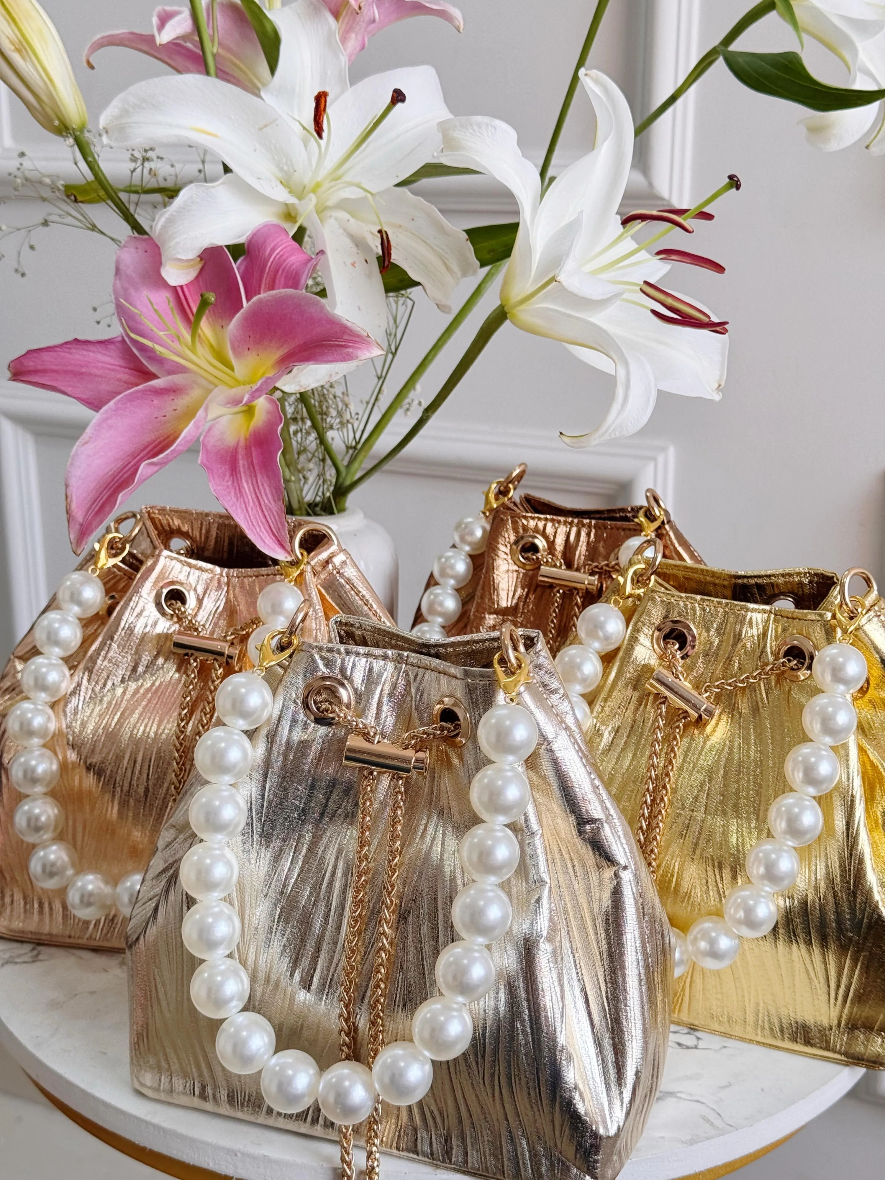 METALLIC BUCKET BAGS