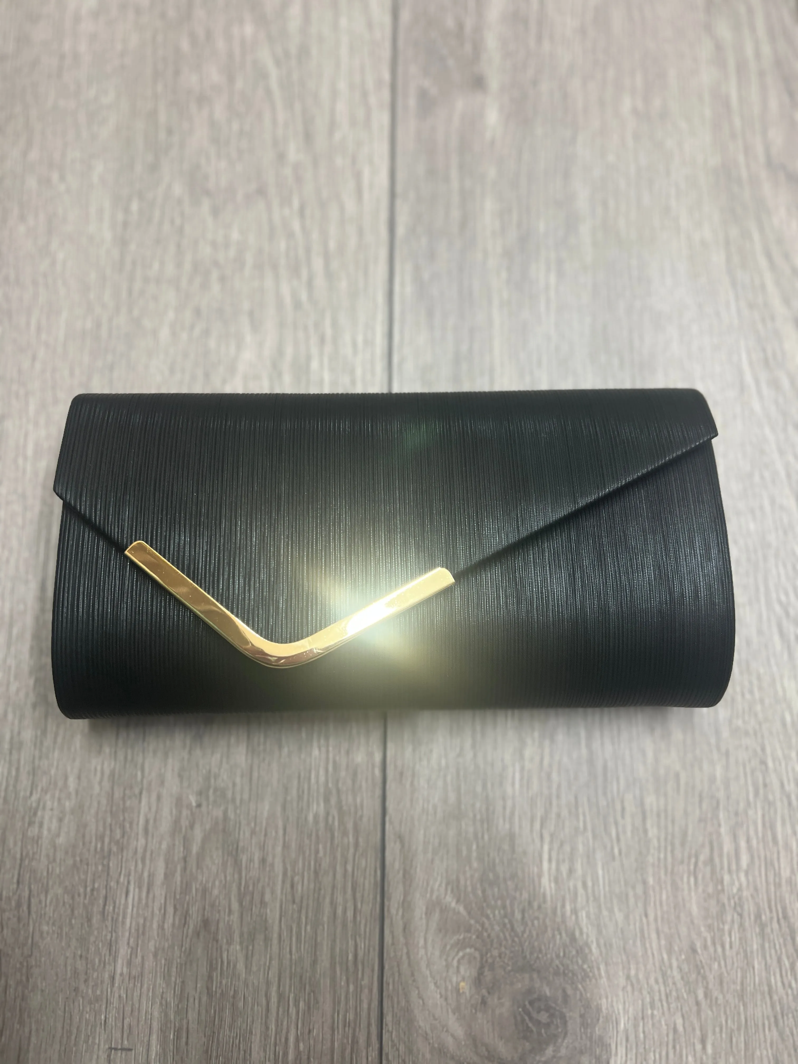 Metallic Clutch Bag With Gold Trim- Black